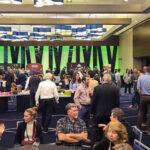 Attendees network and visit exhibitor booths during the CCPPA and CPCI Fall Meetings in Montreal, featuring supplier displays, industry discussions, and presentations highlighting innovation in Canada’s precast concrete industry.