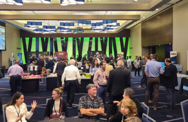 Attendees network and visit exhibitor booths during the CCPPA and CPCI Fall Meetings in Montreal, featuring supplier displays, industry discussions, and presentations highlighting innovation in Canada’s precast concrete industry.